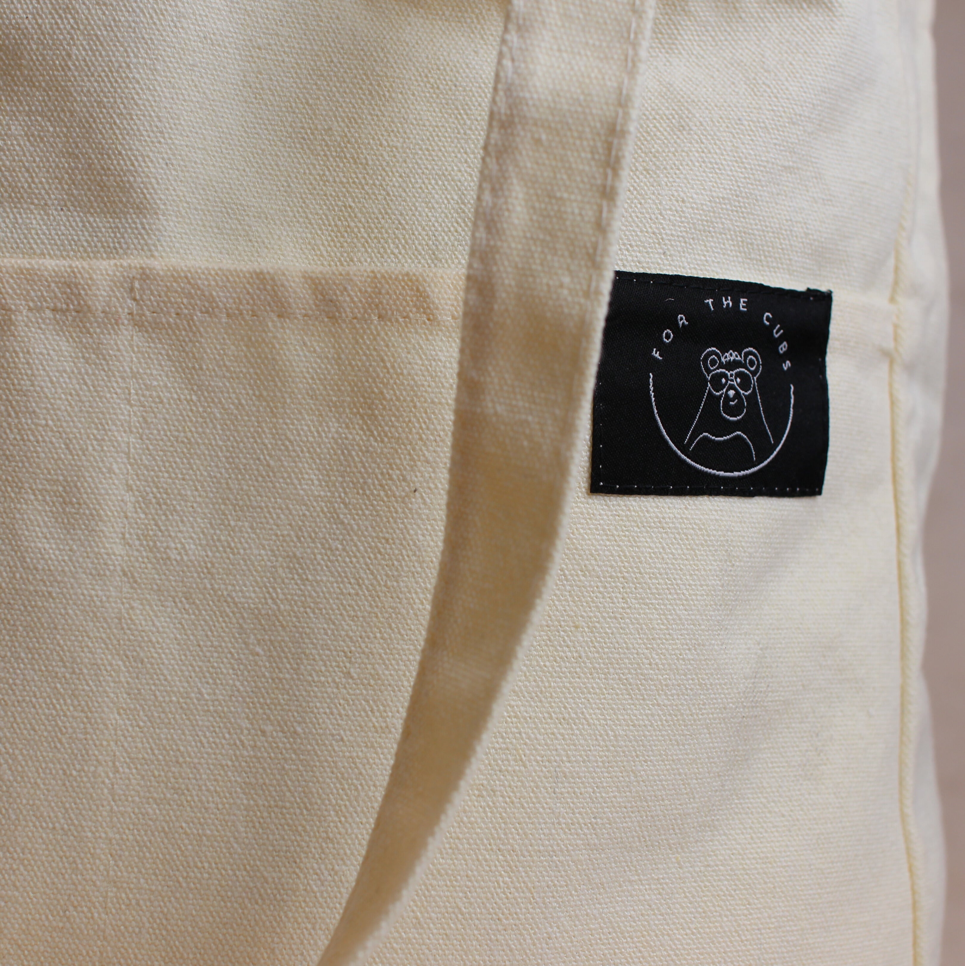 Close up of logo on everywhere tote bag