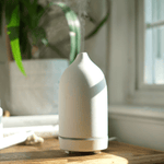 Keep calm diffuser in snow next to window
