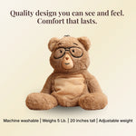 Percy bear with glasses on a beige background with text about product features - machine washable, weighs 5 lb. 20 inches tall, adjustable weight.