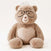 Front shot of weighted stuffed animal percy on light cream background