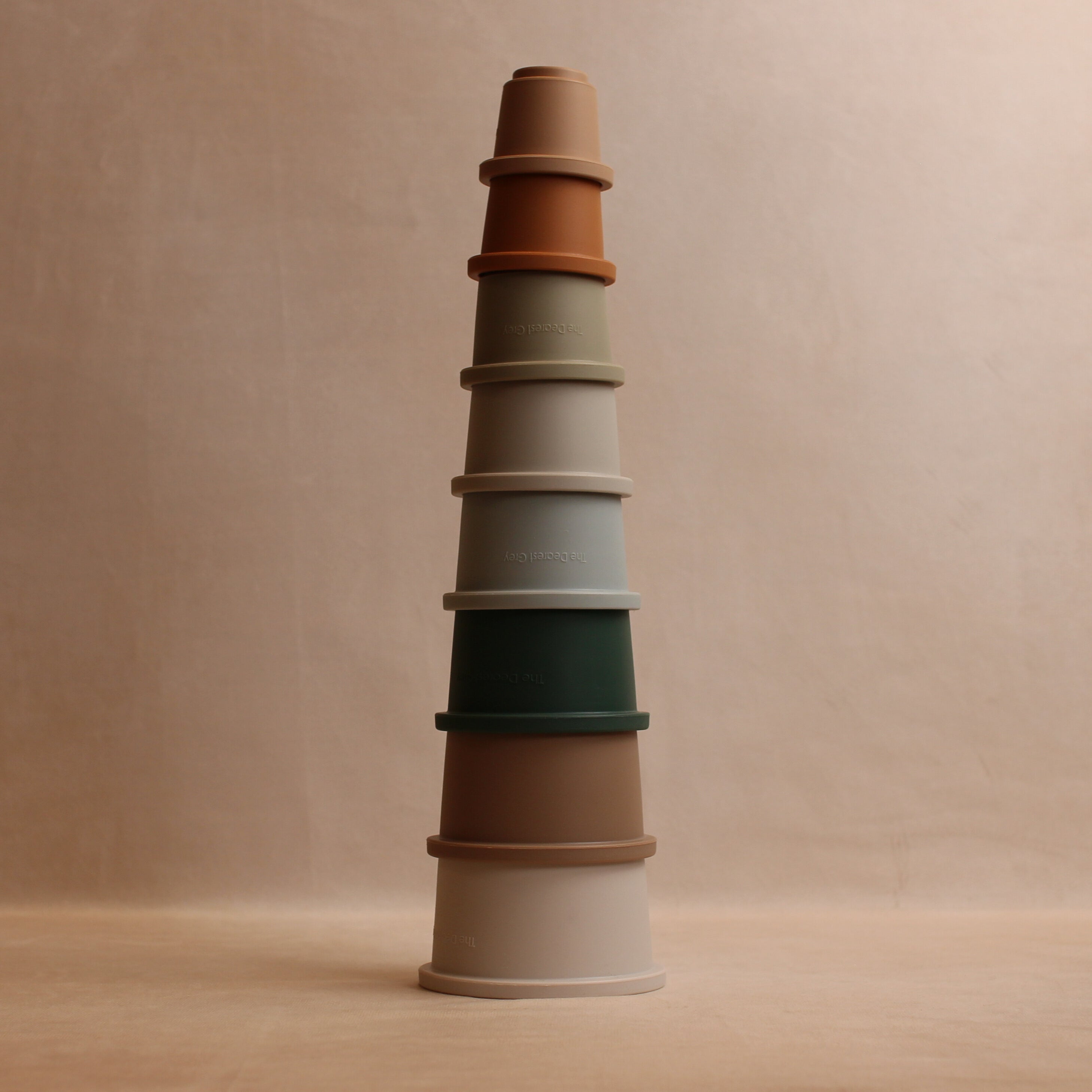 Colorful stacking cups with all colors visible and cups sitting one on top of the other