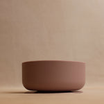 Front view of blush stay put bowl