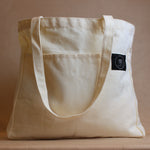 Front view of cream cotton everywhere tote bag