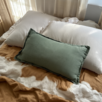 weighted pillow on bed