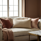 Weighted throw pillow in blush pink for anxiety and stress relief